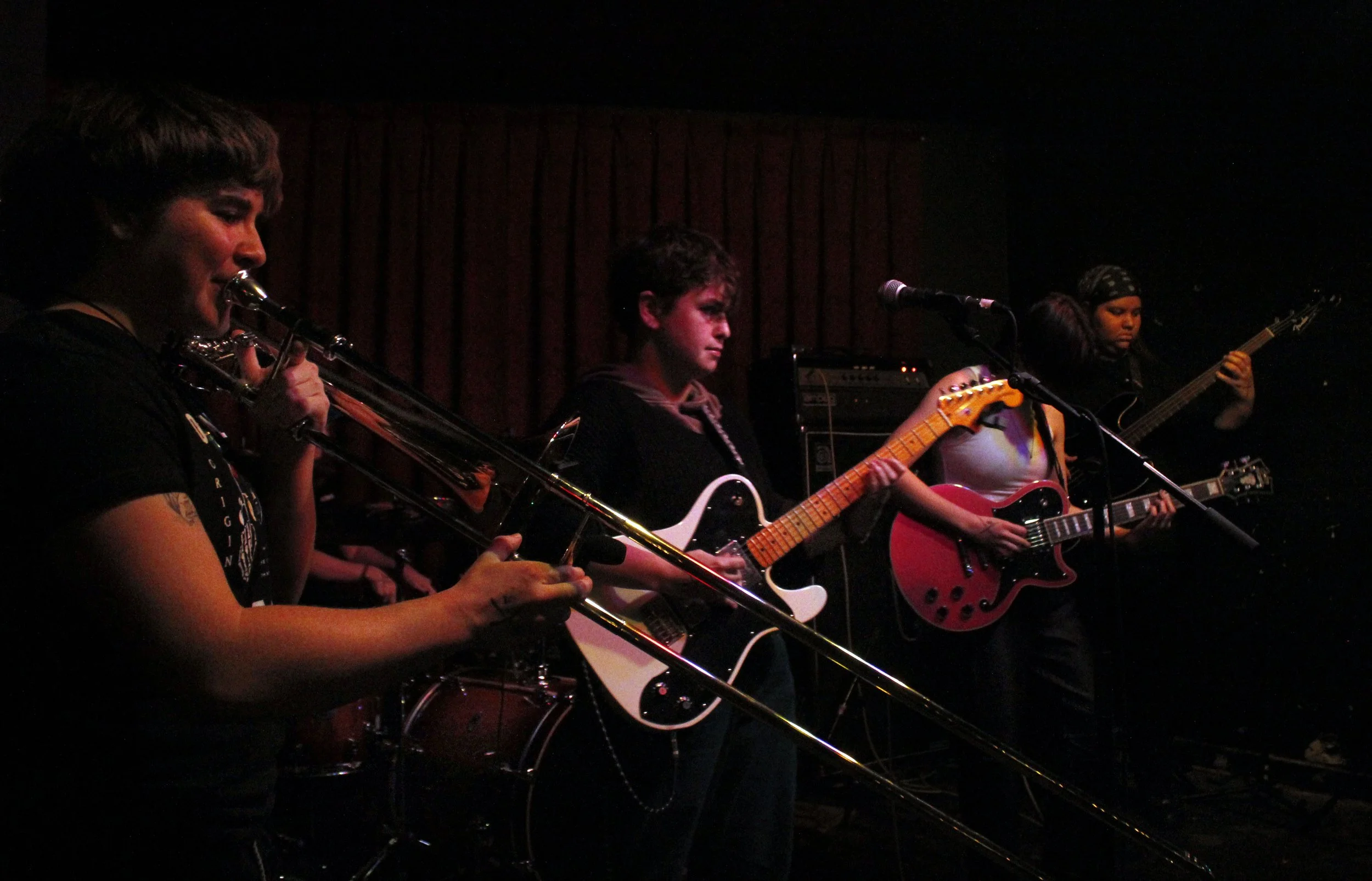   (L to R) Trombonist Kalika Reese, McCarthy, Kopcho, and Reyes of Motherwise  